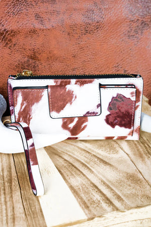 Faux Leather Wristlet with Cow Print Design